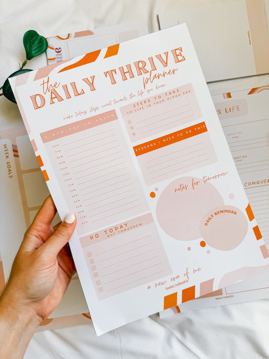 the Daily Thrive Planner - A4 Notepad